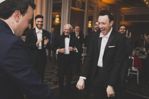 groomsman dances at wedding in Montreal