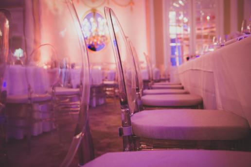 ghost chairs with seat cushions in the Oval room at the Ritz-Carlton Montreal