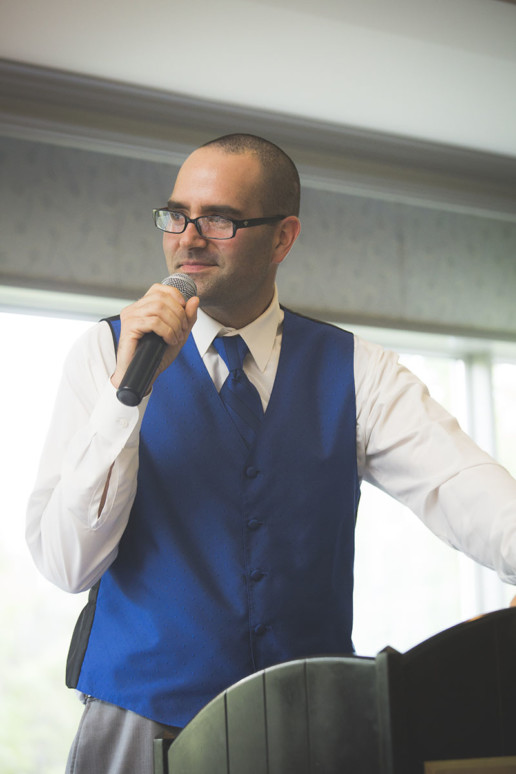 Best man gives his speech during the reception