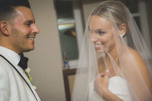 Bride and groom sharing a laugh together