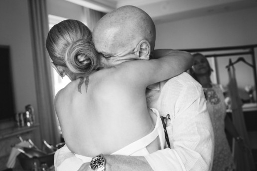 father hugs his daughter during father daughter first look in their suite at the Ritz-Carlton Montreal