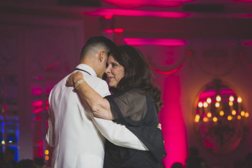 Mother and son dance at the Ritz-Carlton Montreal in the Oval Room