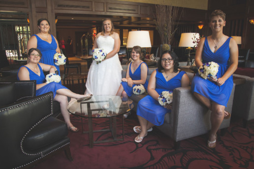 Bride and bridesmaids pose in the lobby of the Rimrock Resort and Hotel